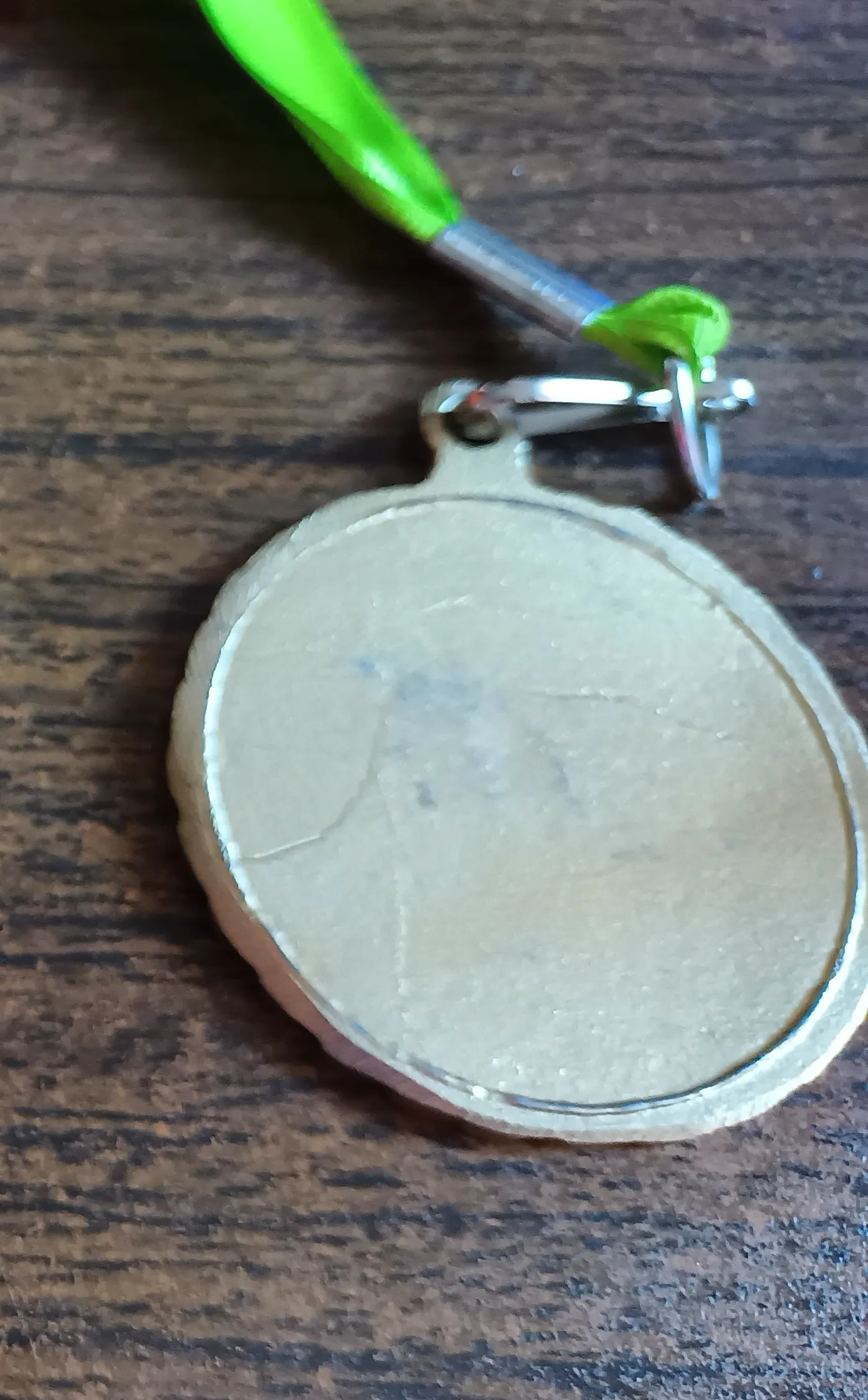 Reverso de la medalla de JA Puebla 2020.